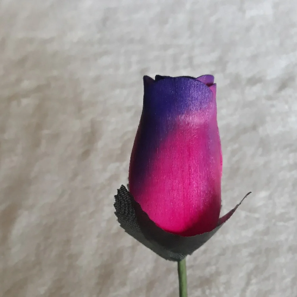 Wooden rose, pink and purple. 13 inches long.